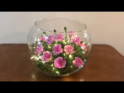 Centros de mesa con luces y flores