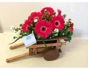 centros-de-mesa-carretas-de-madera-con-flores