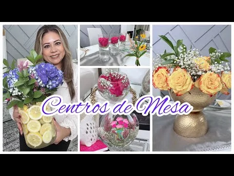 jarrones altos con hermosas flores artificiales en la mesa y el